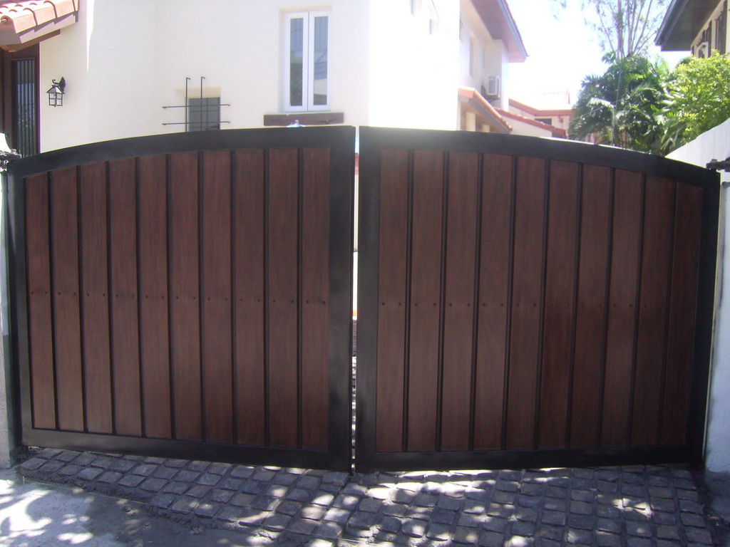 Vehicular Gate in G.I. Sheet Bended and in Wood Finish.