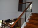 Glass Modern Stair Railing in Wrought Iron Frame